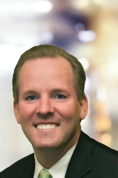 Portrait of Tom Greeves, REALTOR®, ABR®.